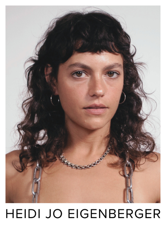 Actress headshot with wavy hair wearing a chain necklace against a plain background, with 'HEIDI JO EIGENBERGER' text at the bottom.